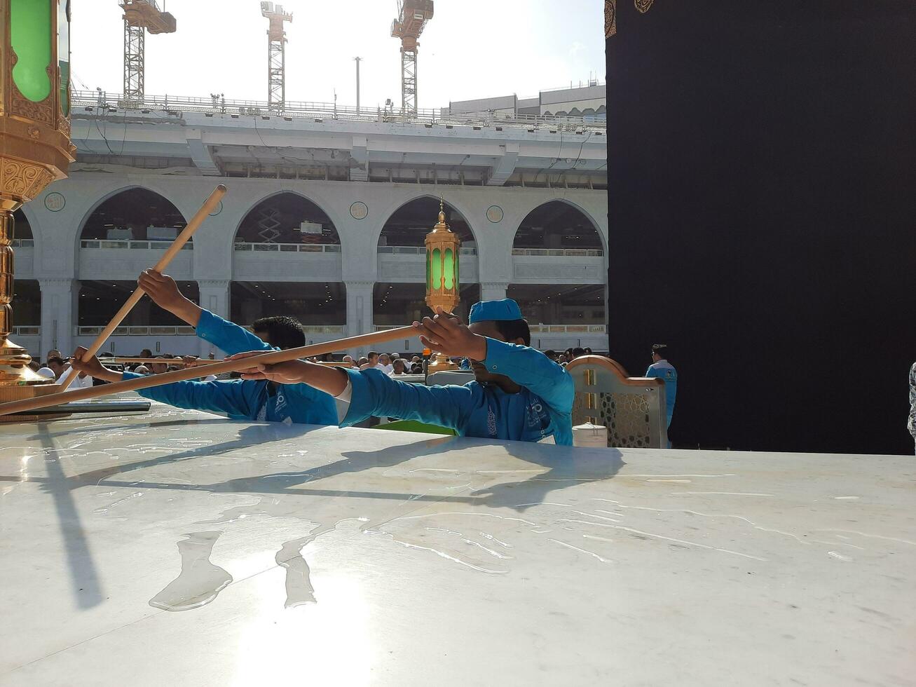 Mecca, Saudi Arabia, May 2023 - A beautiful view of cleaning Hateem during daytime near the Kaaba in the courtyard of Masjid al-Haram, Mecca. photo