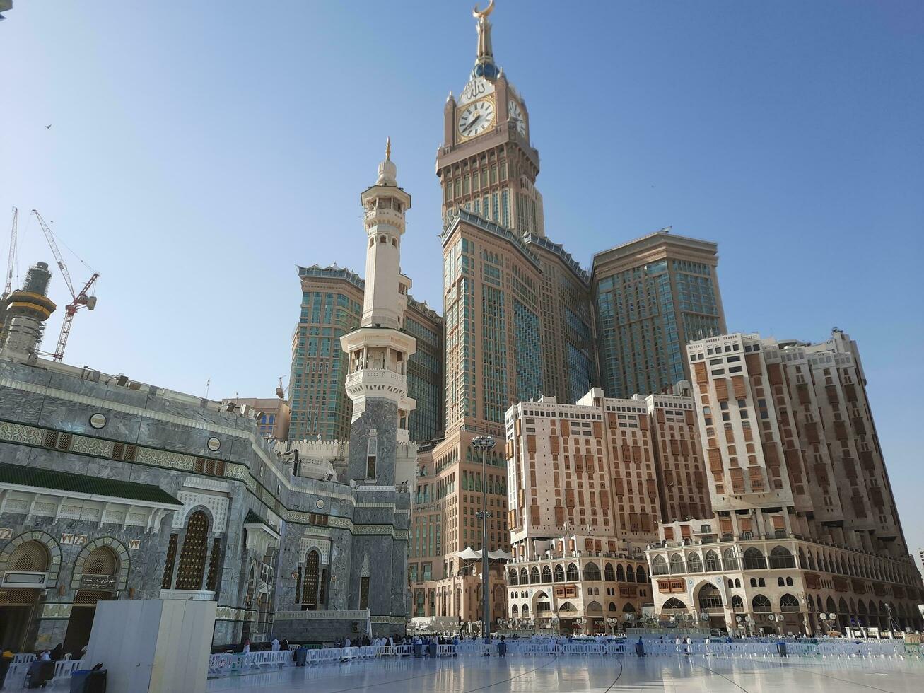 Mecca, Saudi Arabia, April 2023 - A beautiful daytime view of the Makkah Clock Tower from the courtyard of Masjid al-Haram, Mecca. photo