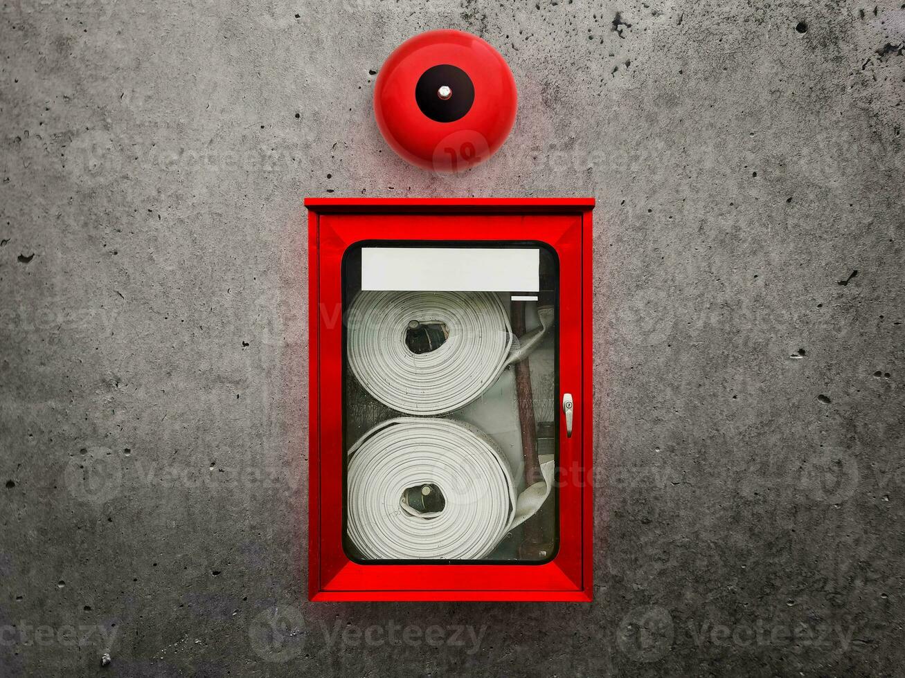 Fire hose cabinet with alarm in office building to prepare fire protection photo