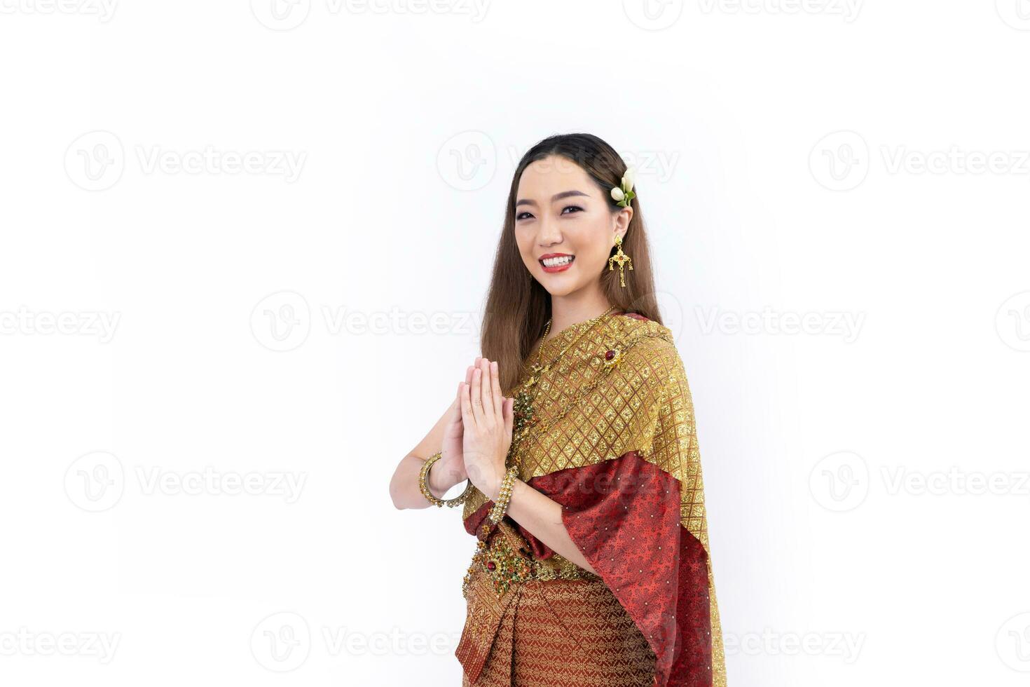 Thai woman in elegant wealthy  traditional dress respect greeting gesture for welcoming and promoting culture in Thailand isolated on white background photo