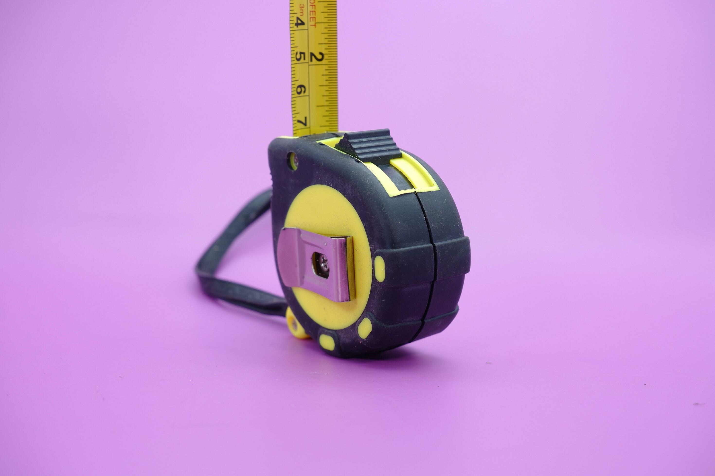 tape measure isolated purple background. measuring tool used by builders.  25287550 Stock Photo at Vecteezy