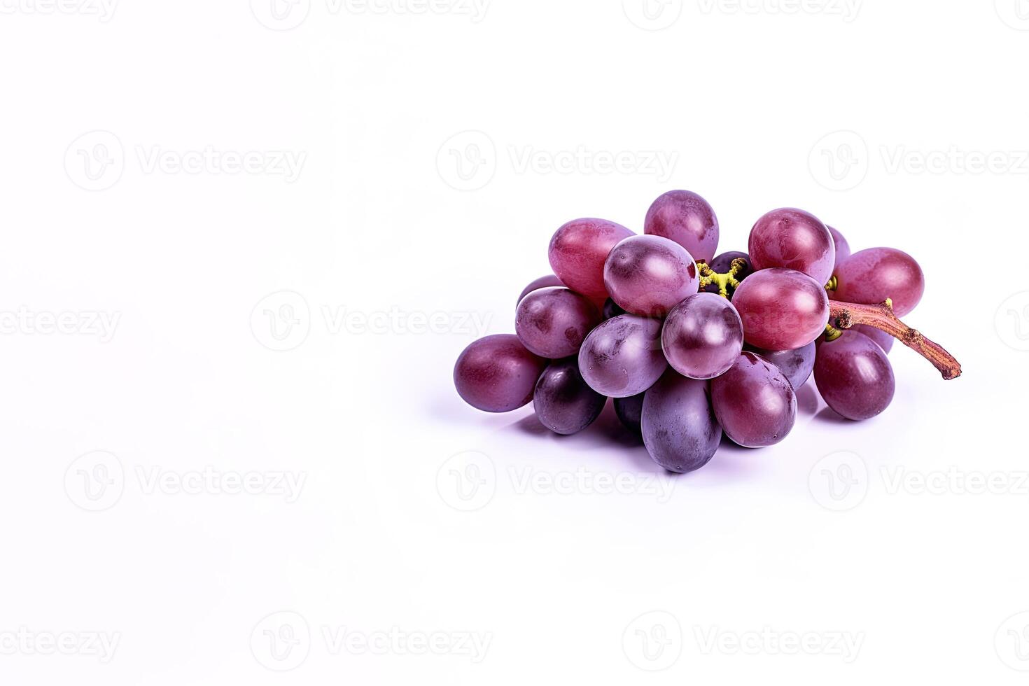 Bunch of ripe red grapes isolated on white background with copy space. photo