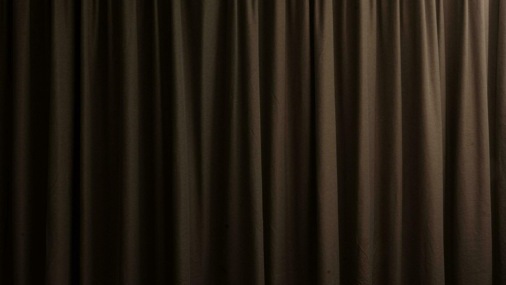 Dark tone of brown curtains for covering the windows. for background and textured. photo