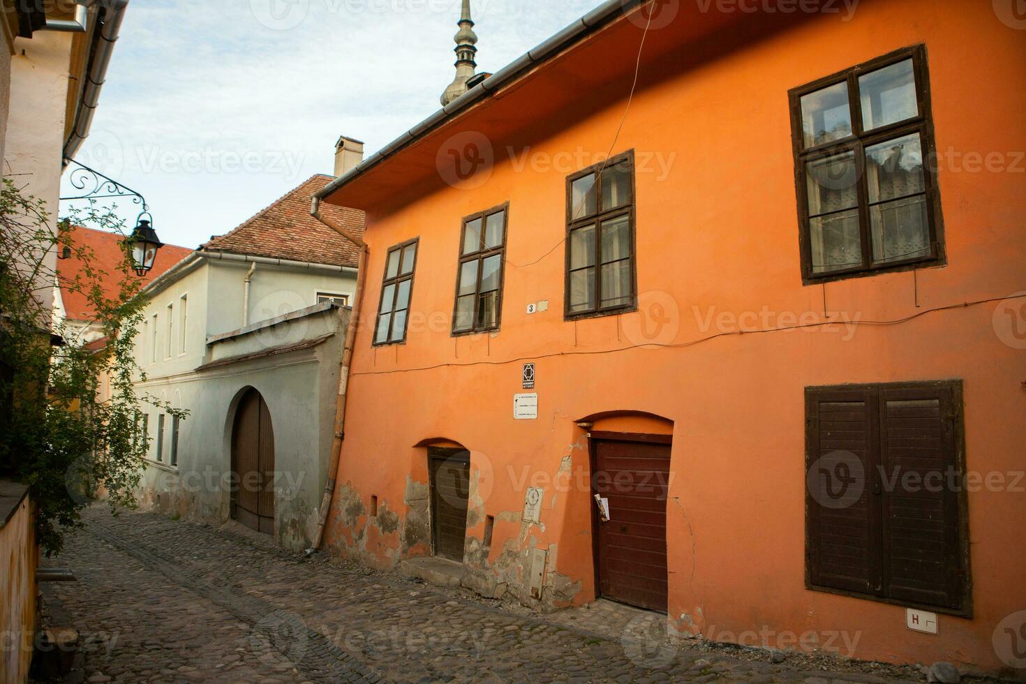 A beautiful medieval citadel city of Sighisoara in the heart of Romania, Transylvania travel destination in Eastern Europe. photo