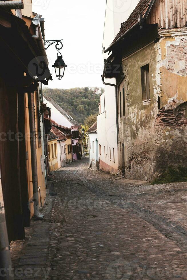 A beautiful medieval citadel city of Sighisoara in the heart of Romania, Transylvania travel destination in Eastern Europe. photo