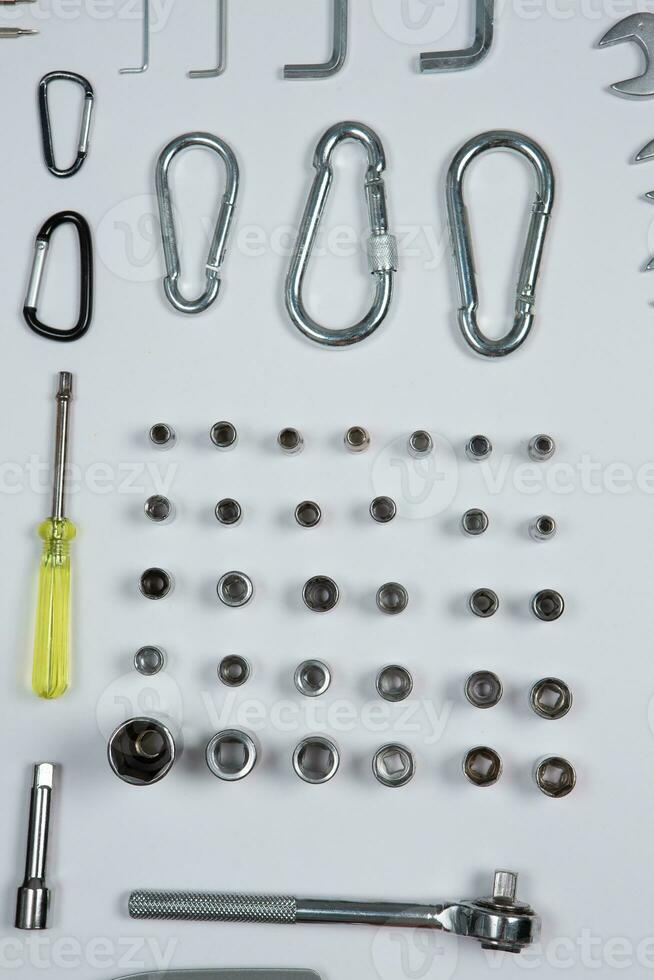 Set of tools for repair in a case on a white background. Assorted work or construction tools. Wrenches, Pliers, screwdriver. Top view photo