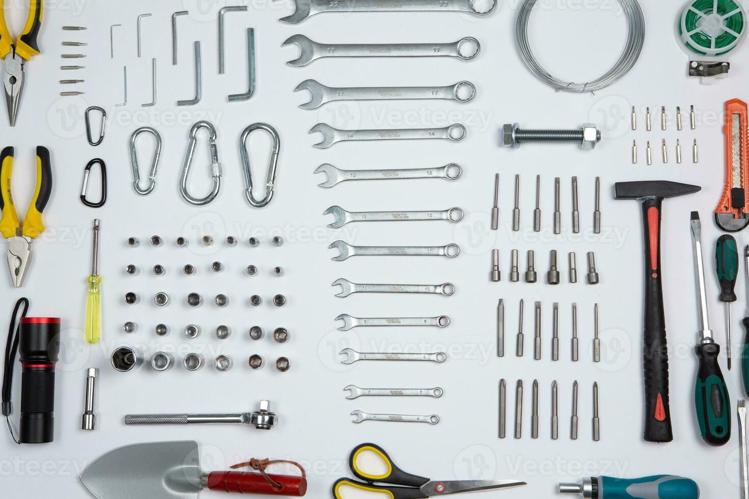 Set of tools for repair in a case on a white background. Assorted work or construction tools. Wrenches, Pliers, screwdriver. Top view photo