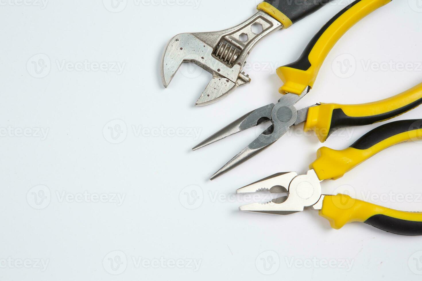 Set of tools for repair in a case on a white background. Assorted work or construction tools. Wrenches, Pliers, screwdriver. Top view photo