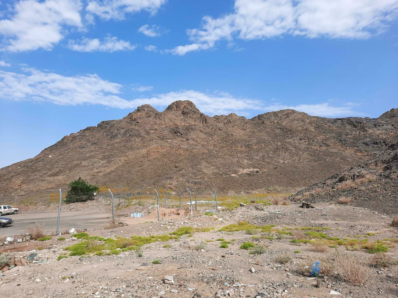 Medina, Saudi Arabia, April 2023 - Beautiful daytime view of mountains and clear sky in Medina, Saudi Arabia. photo