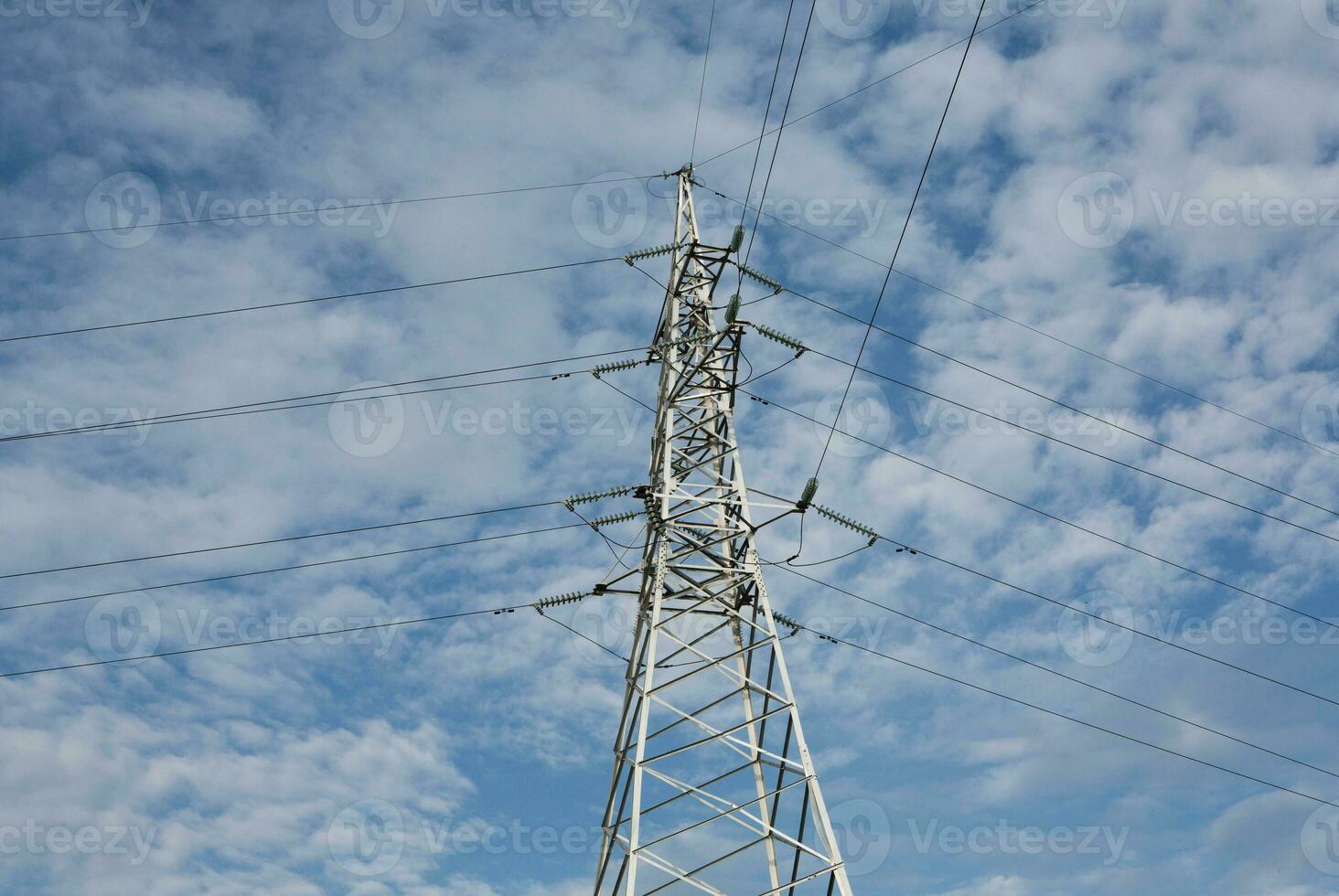 High-voltage power lines at sunset. Electricity distribution station.  electricity pylons on the background of the sky photo