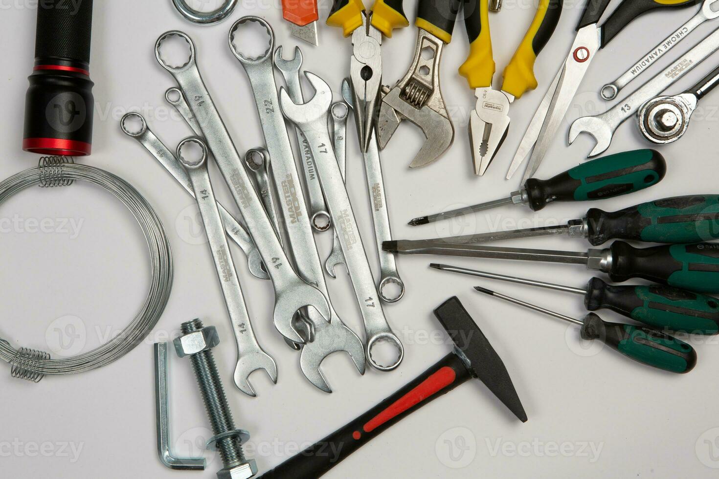 Set of tools for repair in a case on a white background. Assorted work or construction tools. Wrenches, Pliers, screwdriver. Top view photo