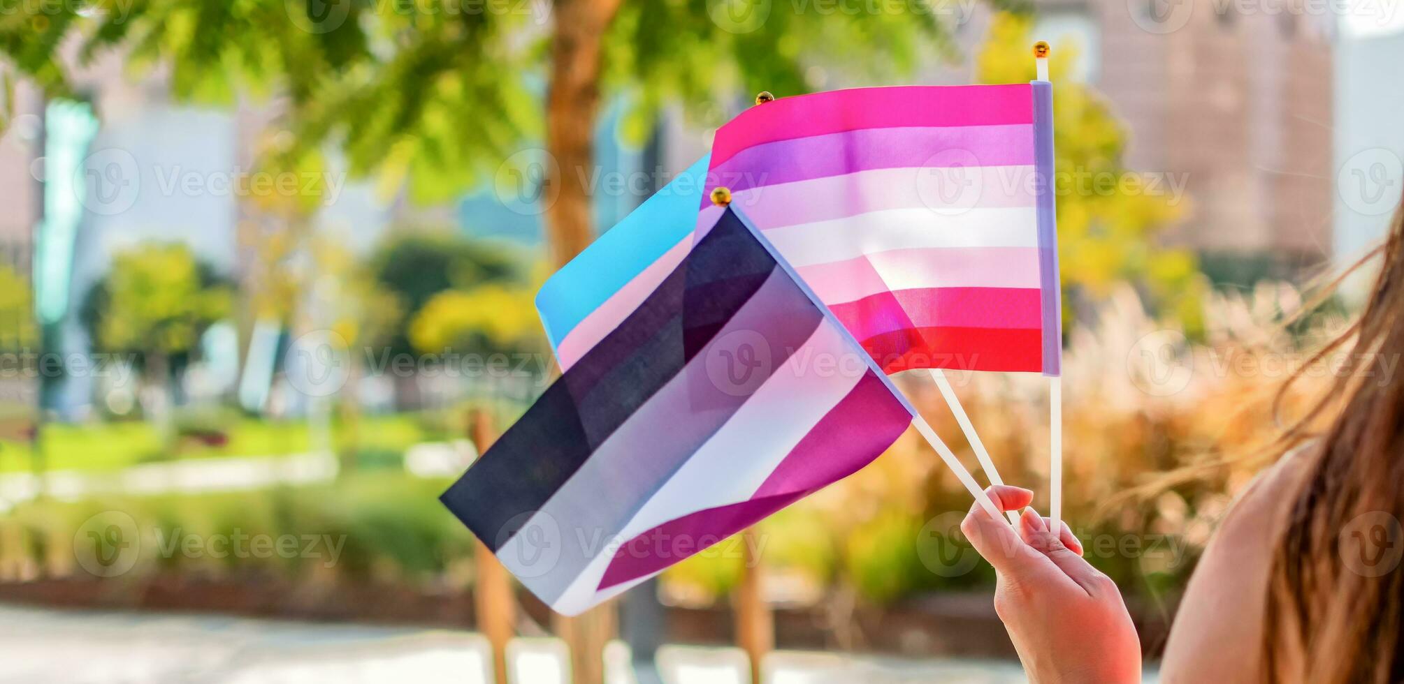 Gender queer. LGBTQ pride flags. Selective focus. photo