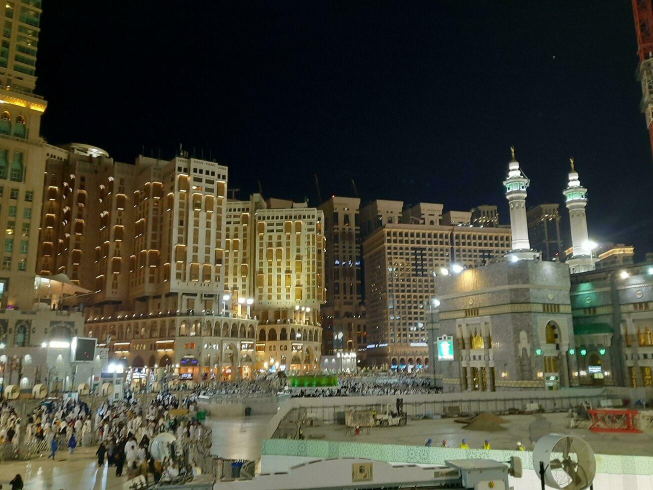 Mecca, Saudi Arabia, June 2023 - At night, there is a large number of pilgrims from all over the world in the outer courtyard of Masjid Al Haram. photo