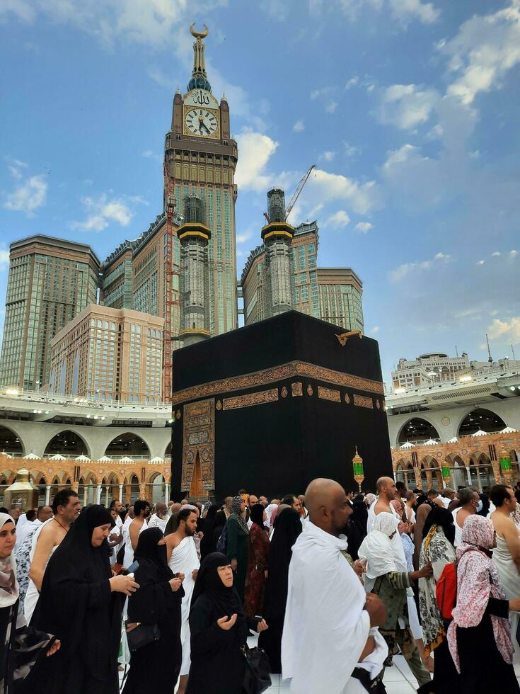 Mecca, Saudi Arabia, June 2023 - Pilgrims from different countries around the world perform Tawaf in the courtyard of Masjid Al Haram, Mecca in the evening. photo
