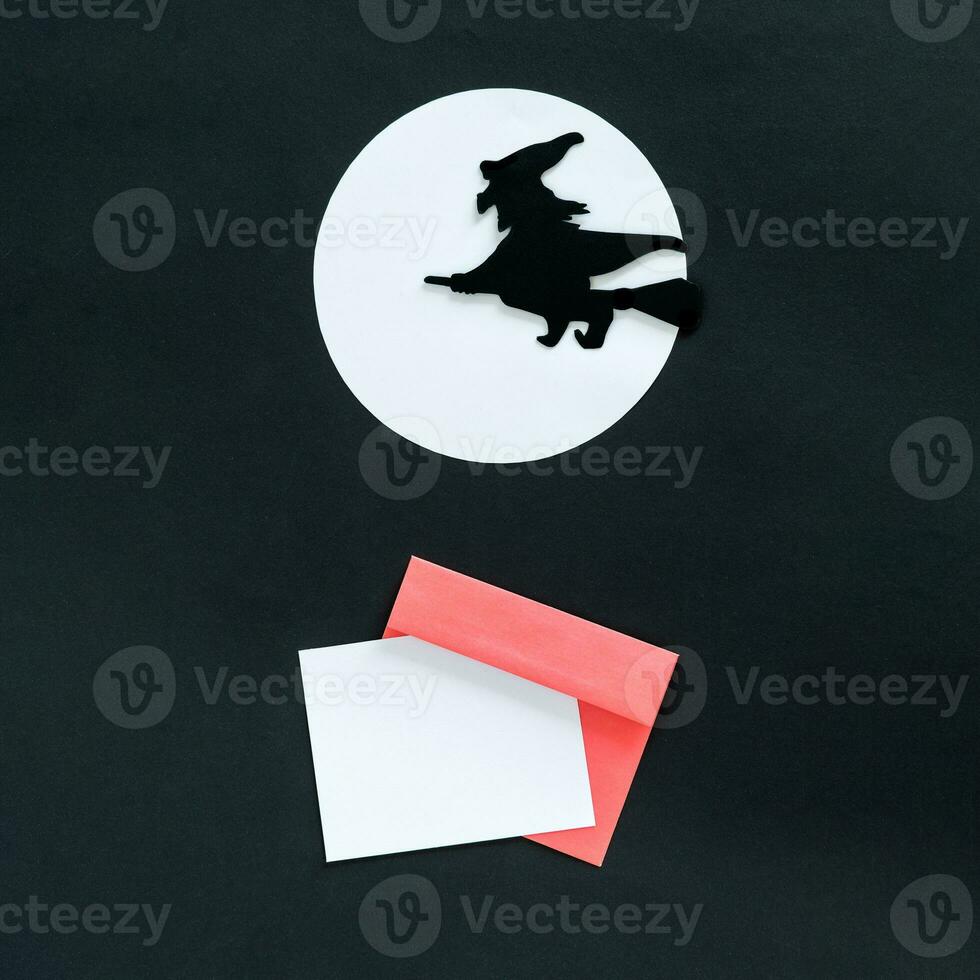 Blank white halloween card with witch and moon. Poster invitation mockup photo