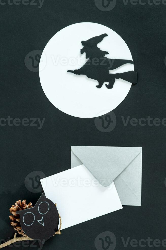 Halloween party invitation card mockup. Flat lay, top view, copy space. photo