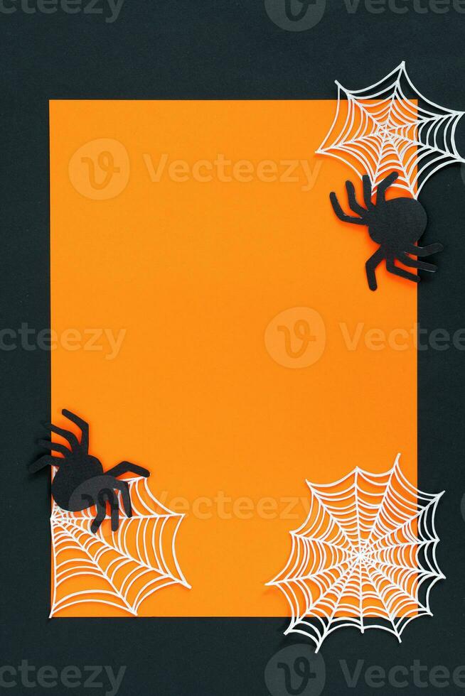 Halloween holiday background with spiders and spider web. View from above. photo