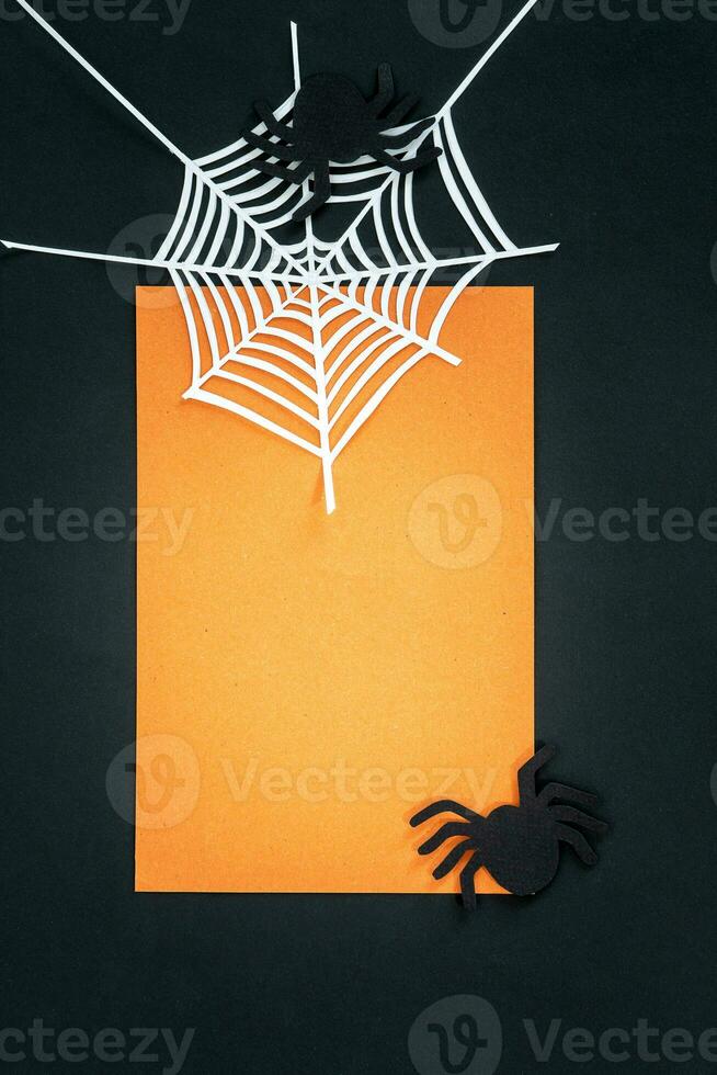 Halloween holiday background with spiders and spider web. View from above. photo