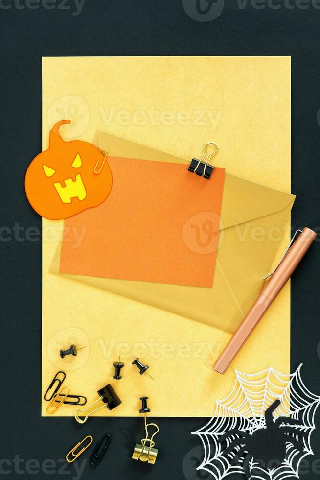 Halloween holiday invitation with pumpkin. photo