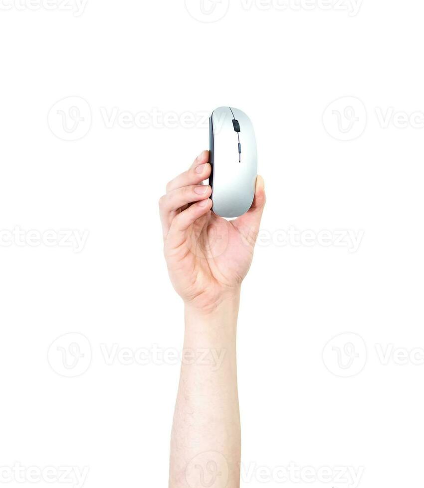 Man's arm raised holding a PC mouse. Technology concept. Isolate on white background. photo