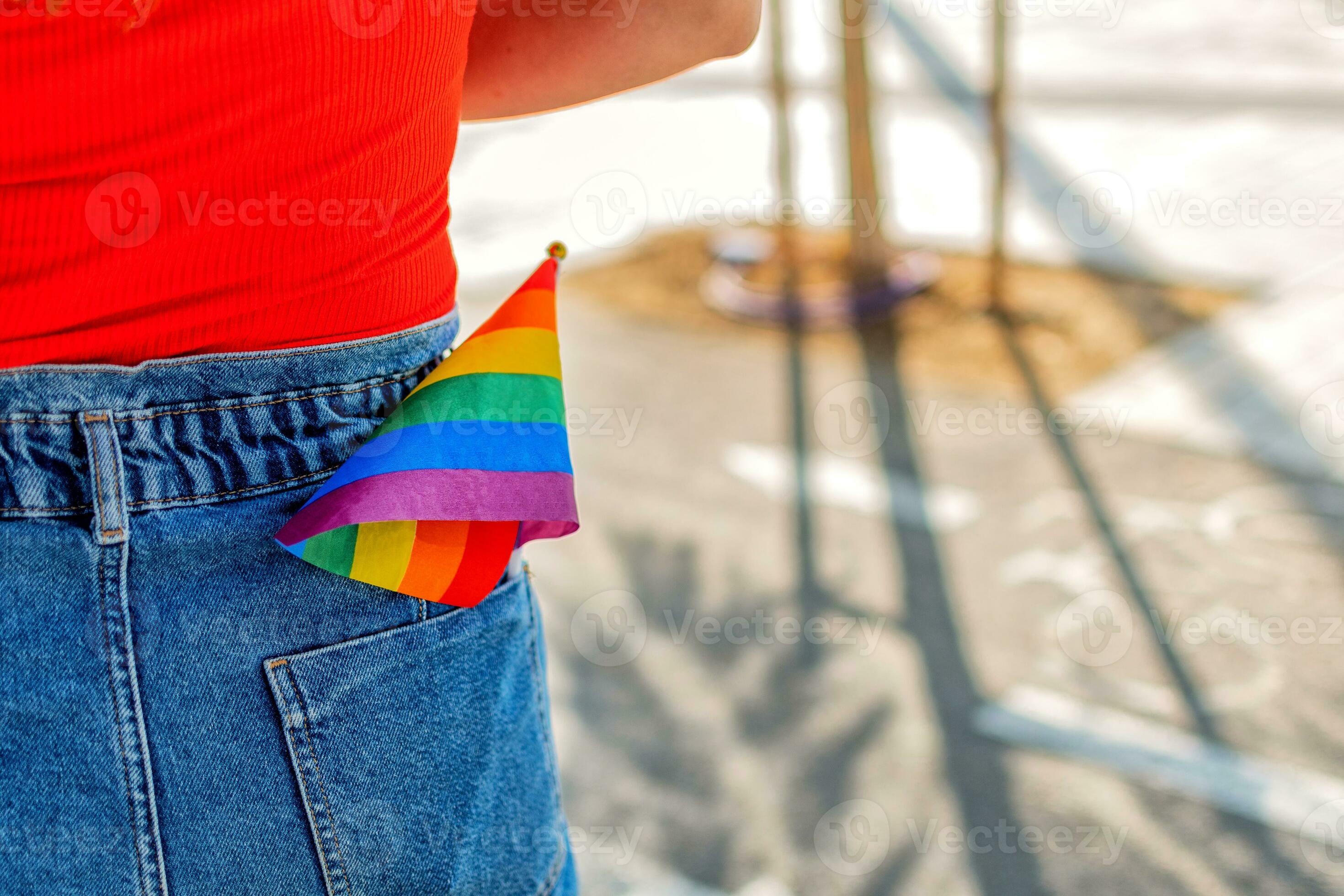 Small Rainbow Pride Flag in jeans pocket. LGBT pride flag. 25300575