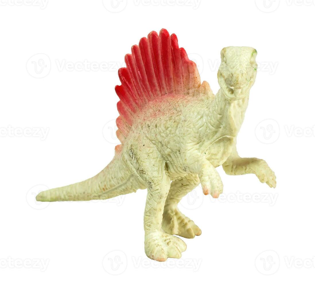 Spinosaurus dinosaur plastic toy stands isolated on white background. photo