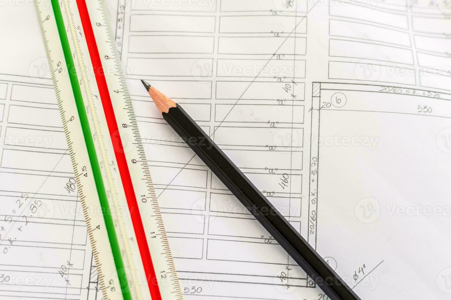 Drafting Tools and blueprint . Pencil and ruler on blueprint. photo