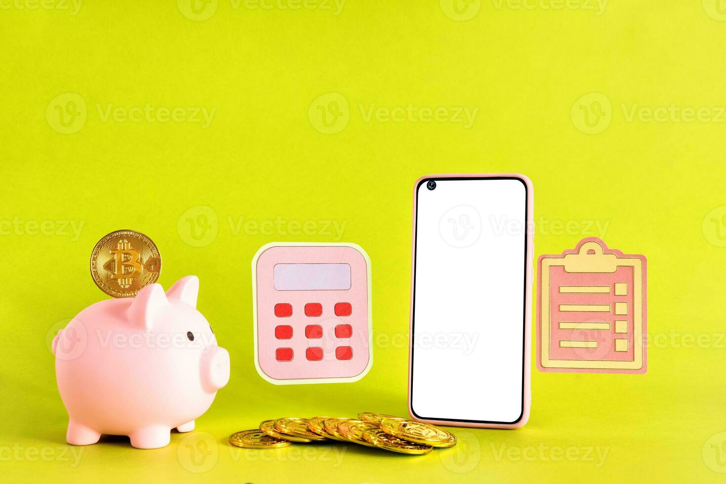 smart phone, piggy bank, calculator, coins, bit coin, on yellow background. Savings concept. photo