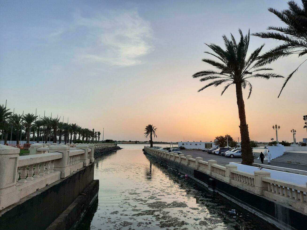 Jeddah, Saudi Arabia, June 2023 - A beautiful view of the sunset at Jeddah Corniche in the evening. photo