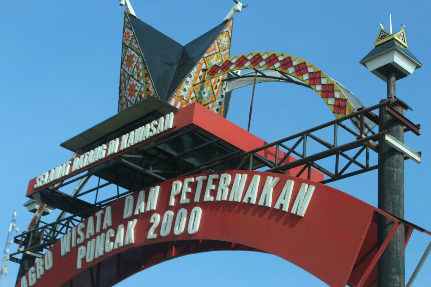 Karo, Indonesia, April 2023 - view of the welcome monument.  visitor entrance at the top of 200. photo