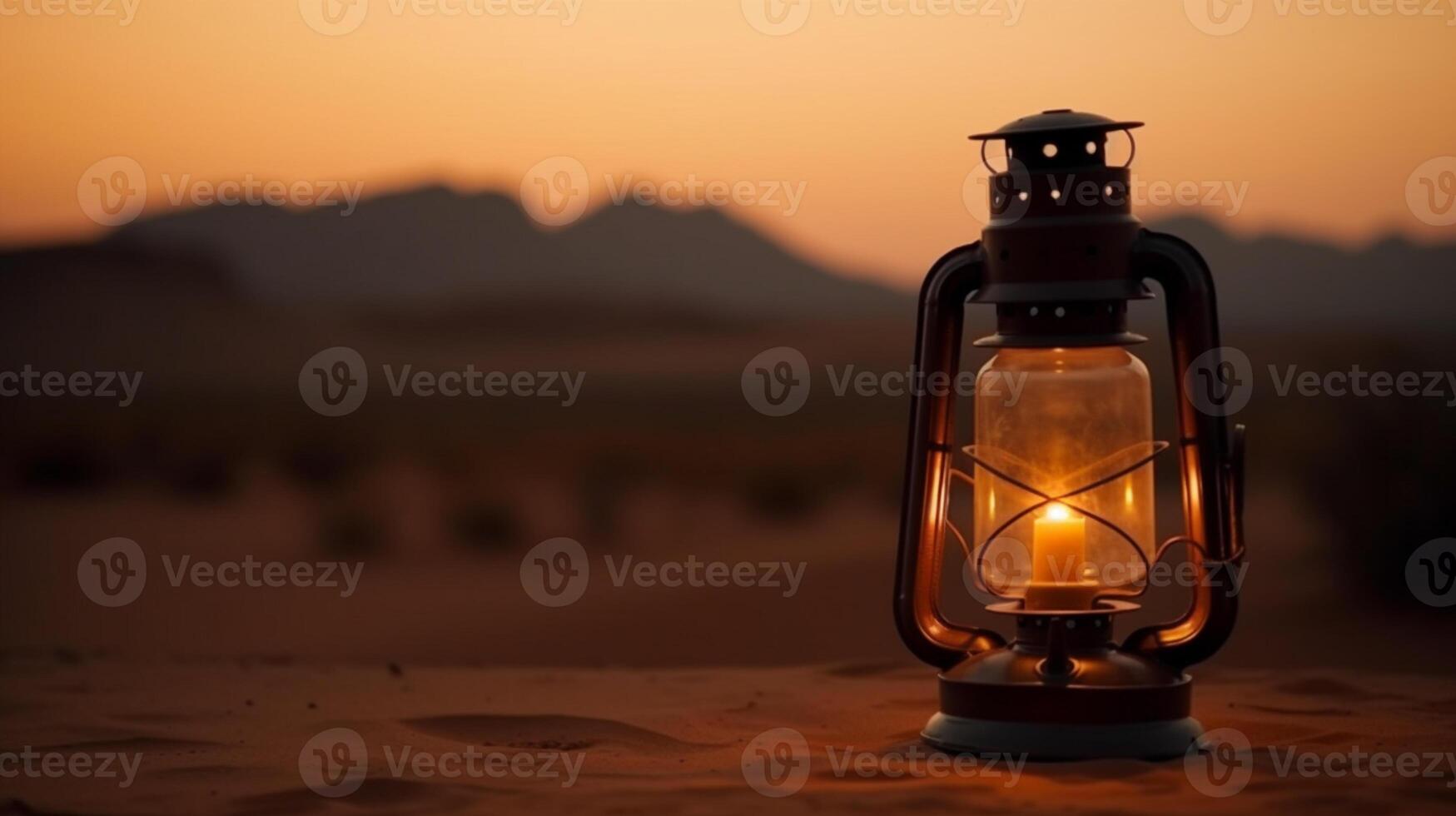 Ramadan lantern. A lantern in the desert with the sun setting behind it. Lantern with candle inside. . photo