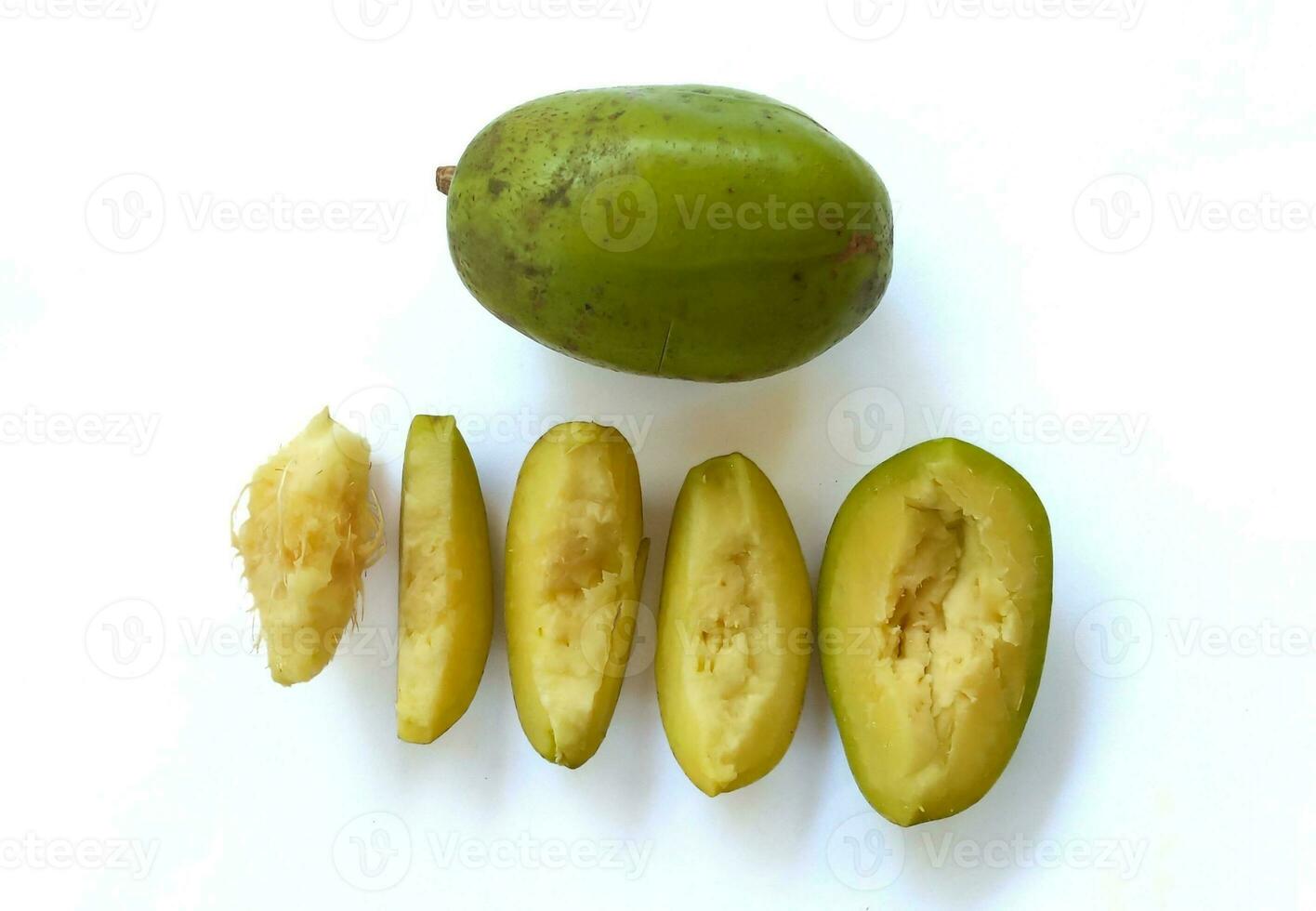 Kedondong also known as ambarella fruit or otaheite apple great hot plum fruit isolated on a white background. Scientific name is Spondias dulcis.Clipping path. photo
