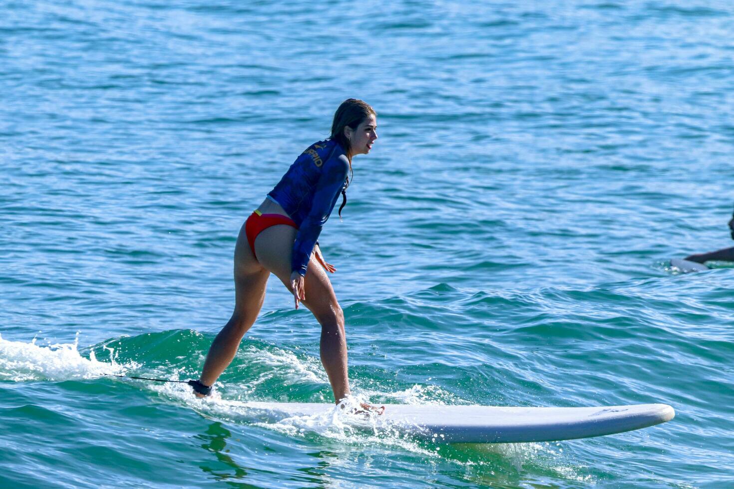 Rio de Janeiro, RJ, Brazil, 05.08.2023 - Surfers riding waves on Arpoador Beach, Ipanema photo