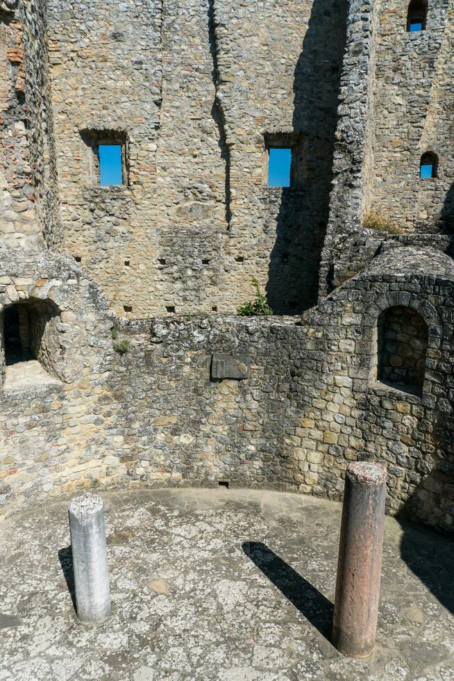 Canossa, Italy-July 31, 2022-view of the Canossa castle ruins in the province of Parma during a sunny day photo