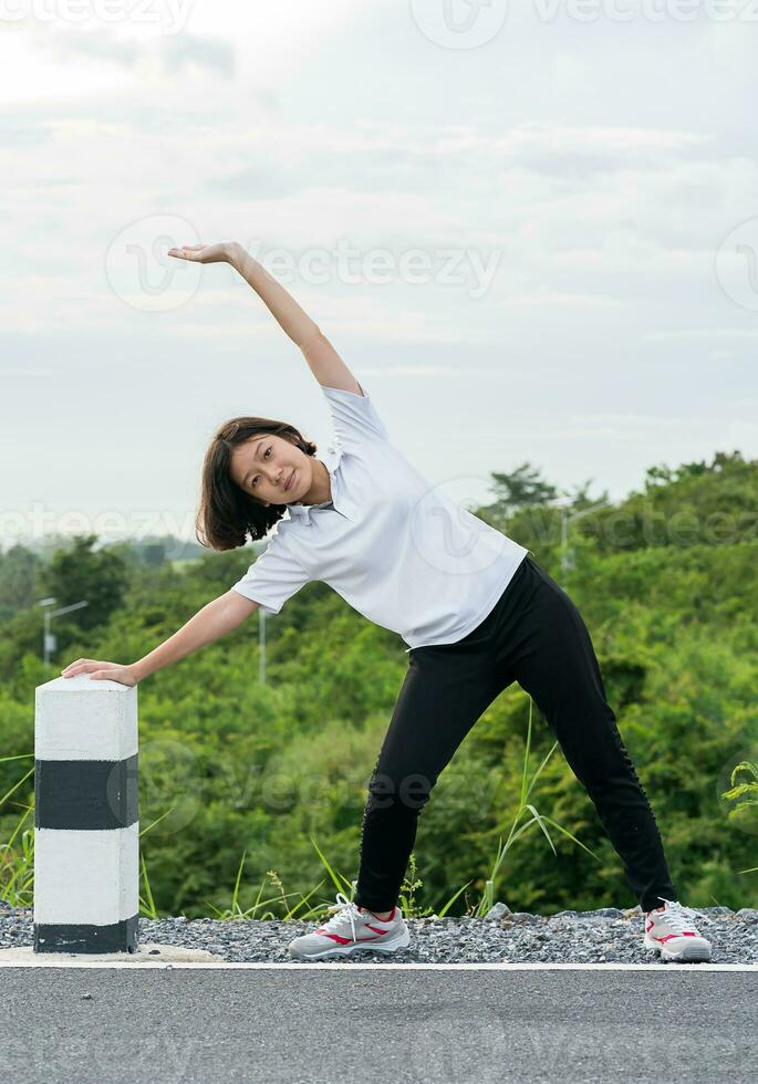 Woman preparing for jogging outdoor photo