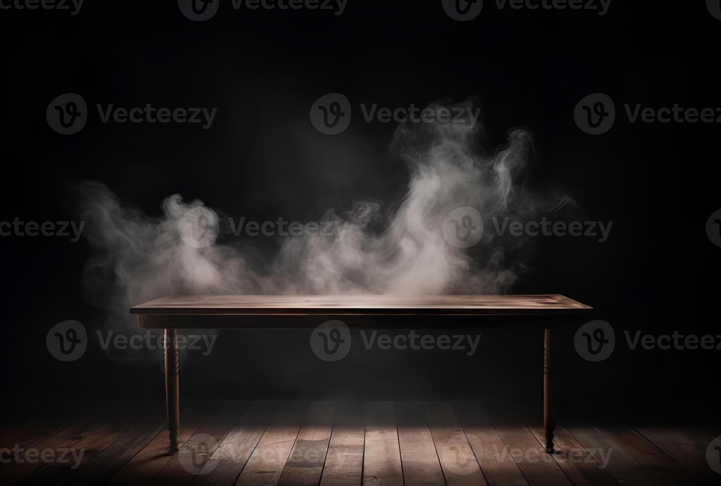 A table with smoke coming out of it and a black background. photo