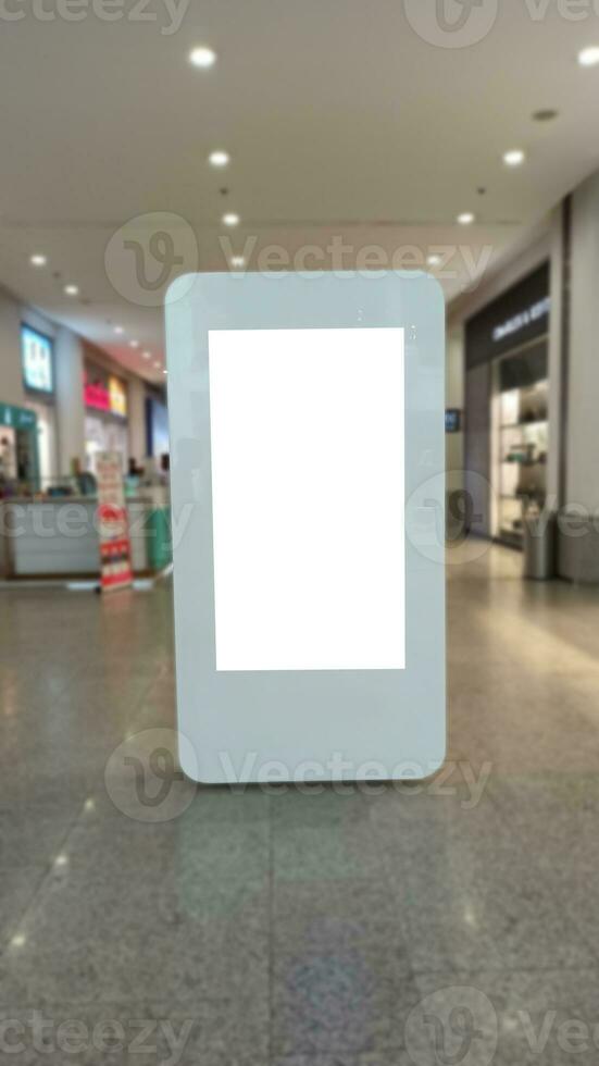 Blank advertising banner mockup in modern airport retail environment large digital display screen. Billboard, poster, out-of-home media display space. photo