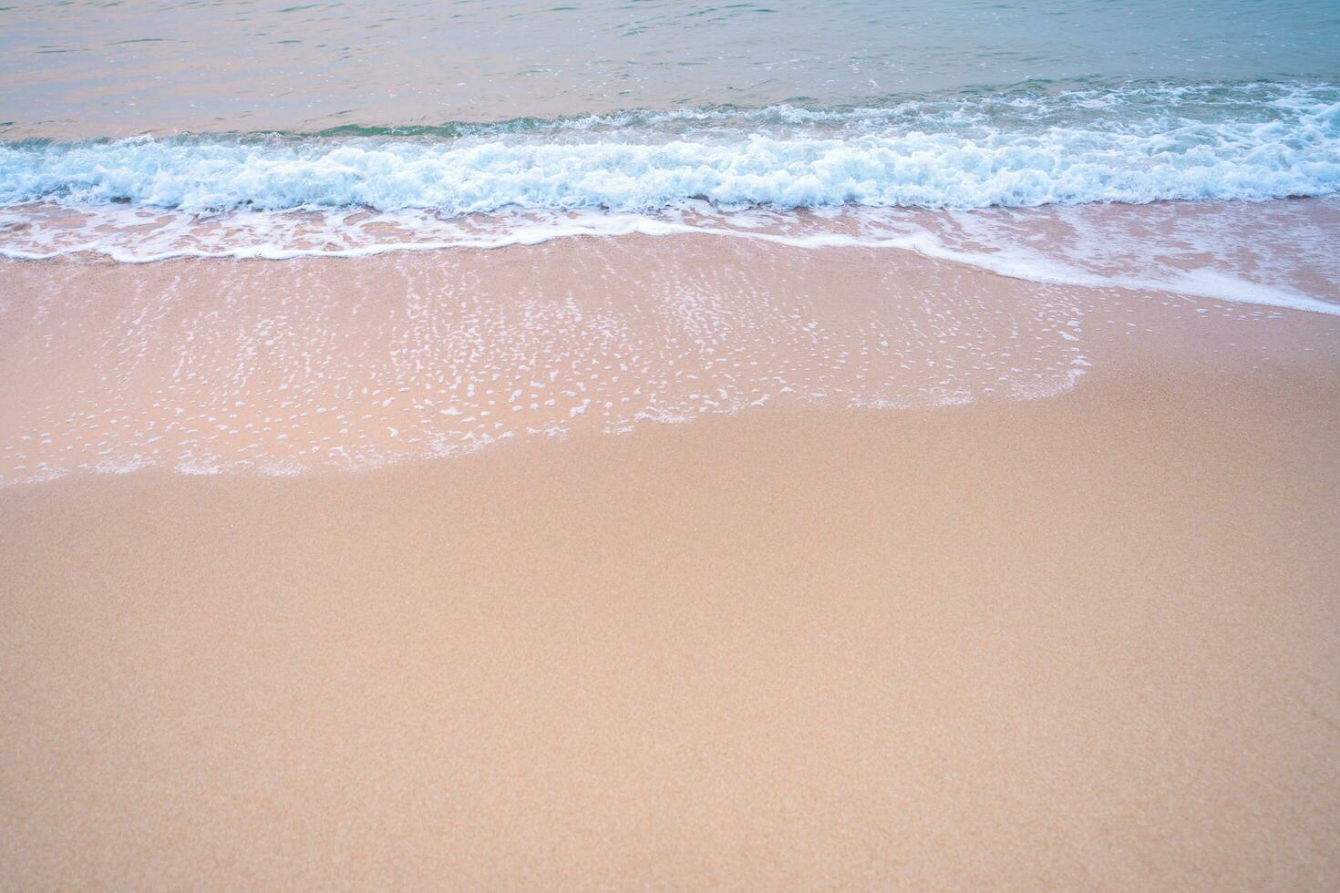 White foam and brown sand. at the sea of Thailand, Empty sea floor and beach with copy space photo