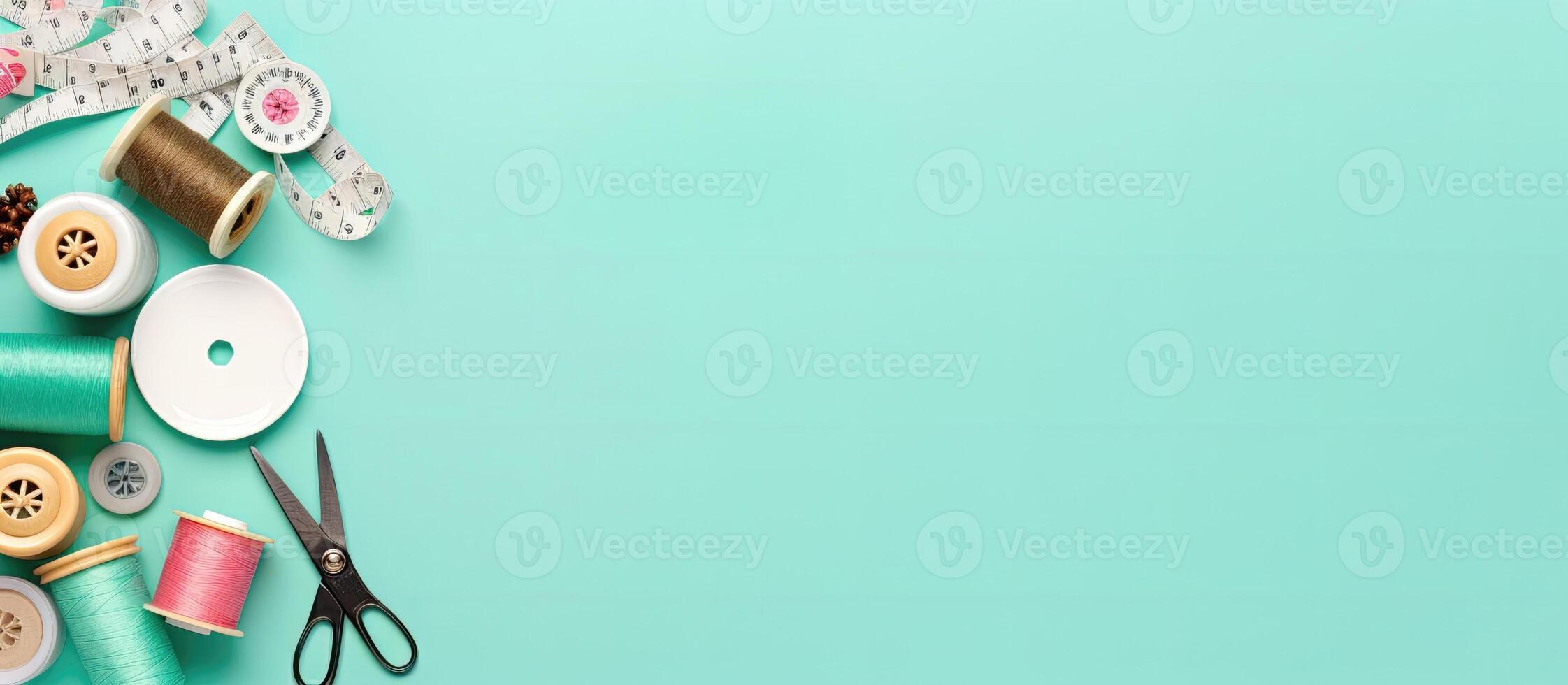 Sewing supplies and thread on a turquoise background created with technology photo