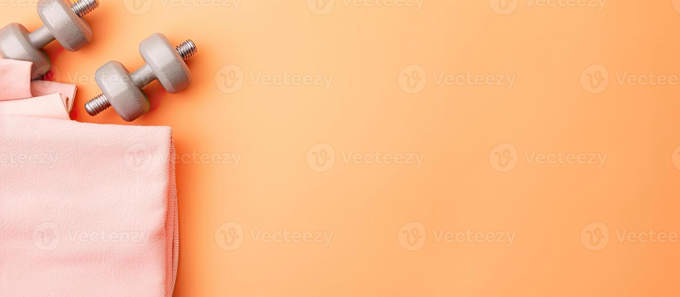 A pair of dumbs sitting on top of a pink bag created with technology photo