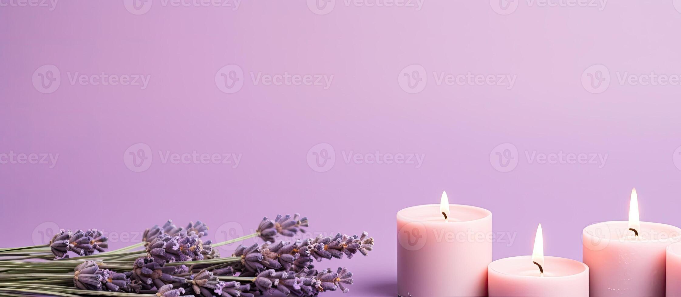 A bunch of candles sitting next to some lavender flowers created with Generative AI technology photo