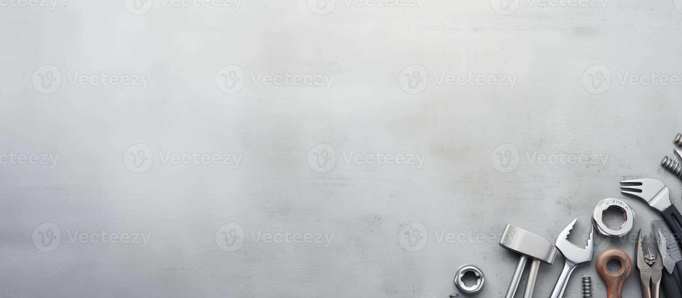 A bunch of tools are arranged on a metal surface created with technology photo