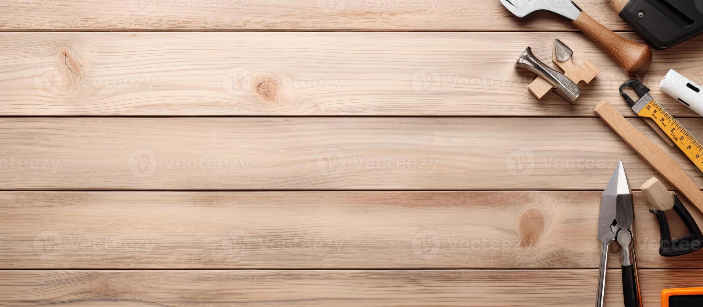 A wooden table topped with lots of tools created with technology photo