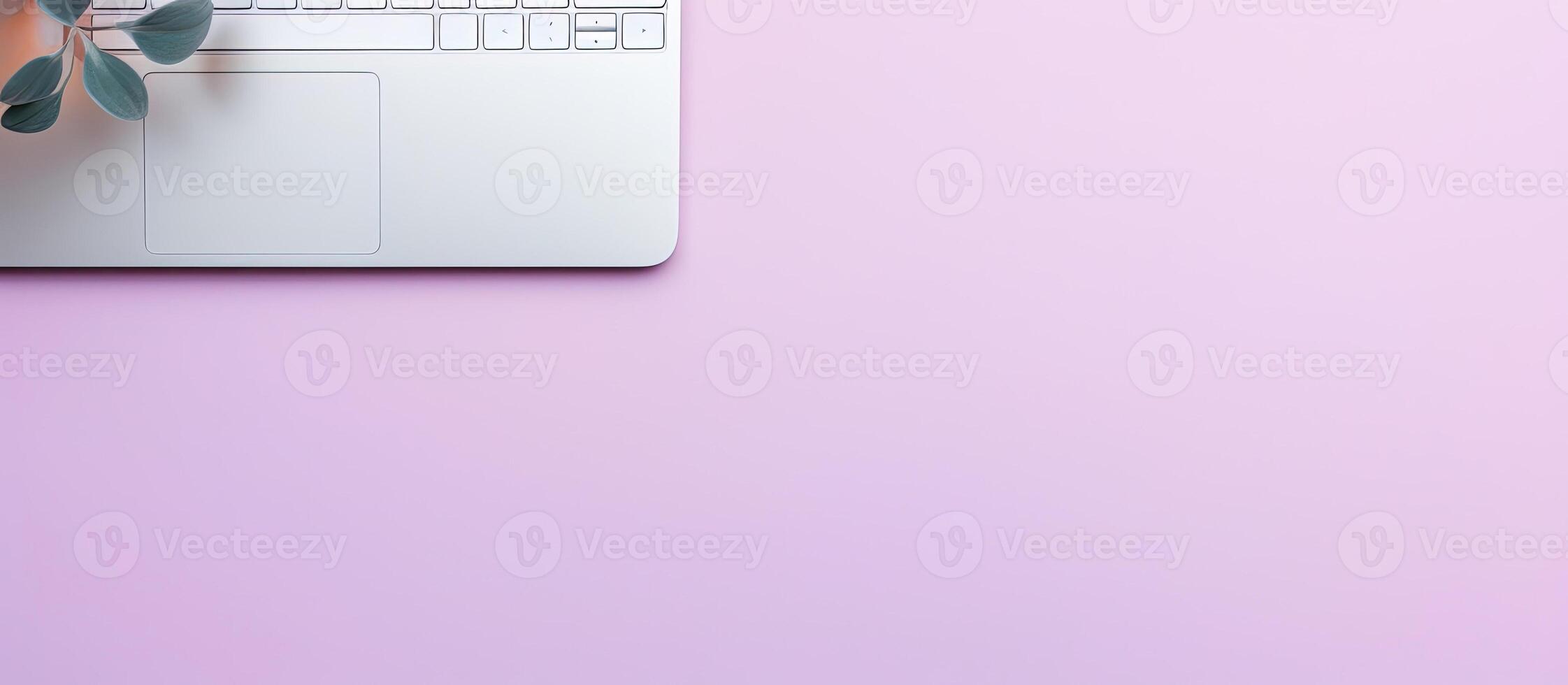 A laptop computer sitting on top of a pink table created with technology photo