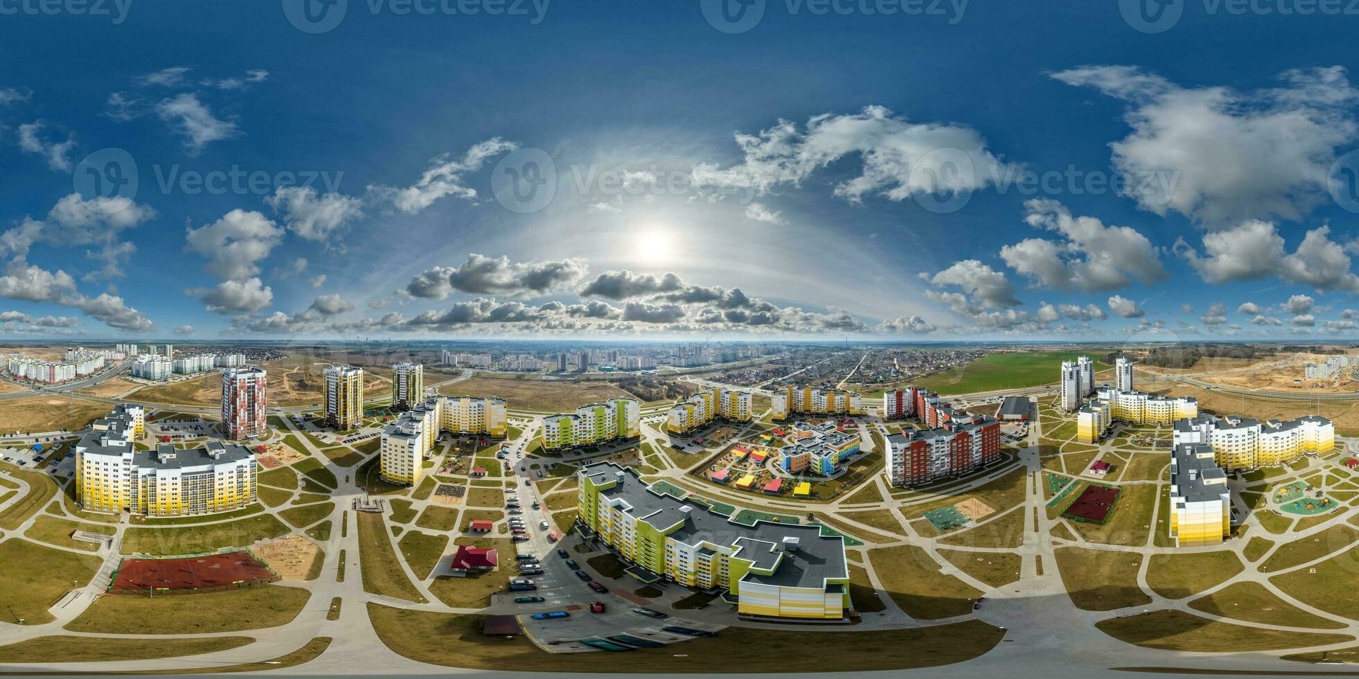 aerial seamless spherical hdri 360 panorama view above modern residential complex with high-rise buildings in town in equirectangular projection. photo