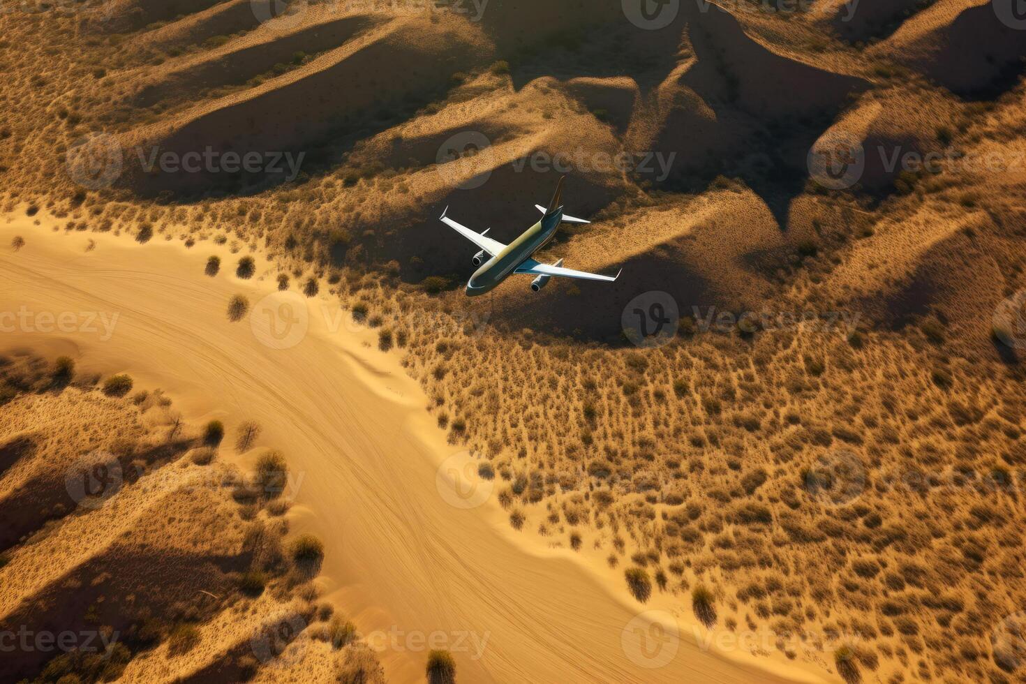 airplane plane flying over the desert photo