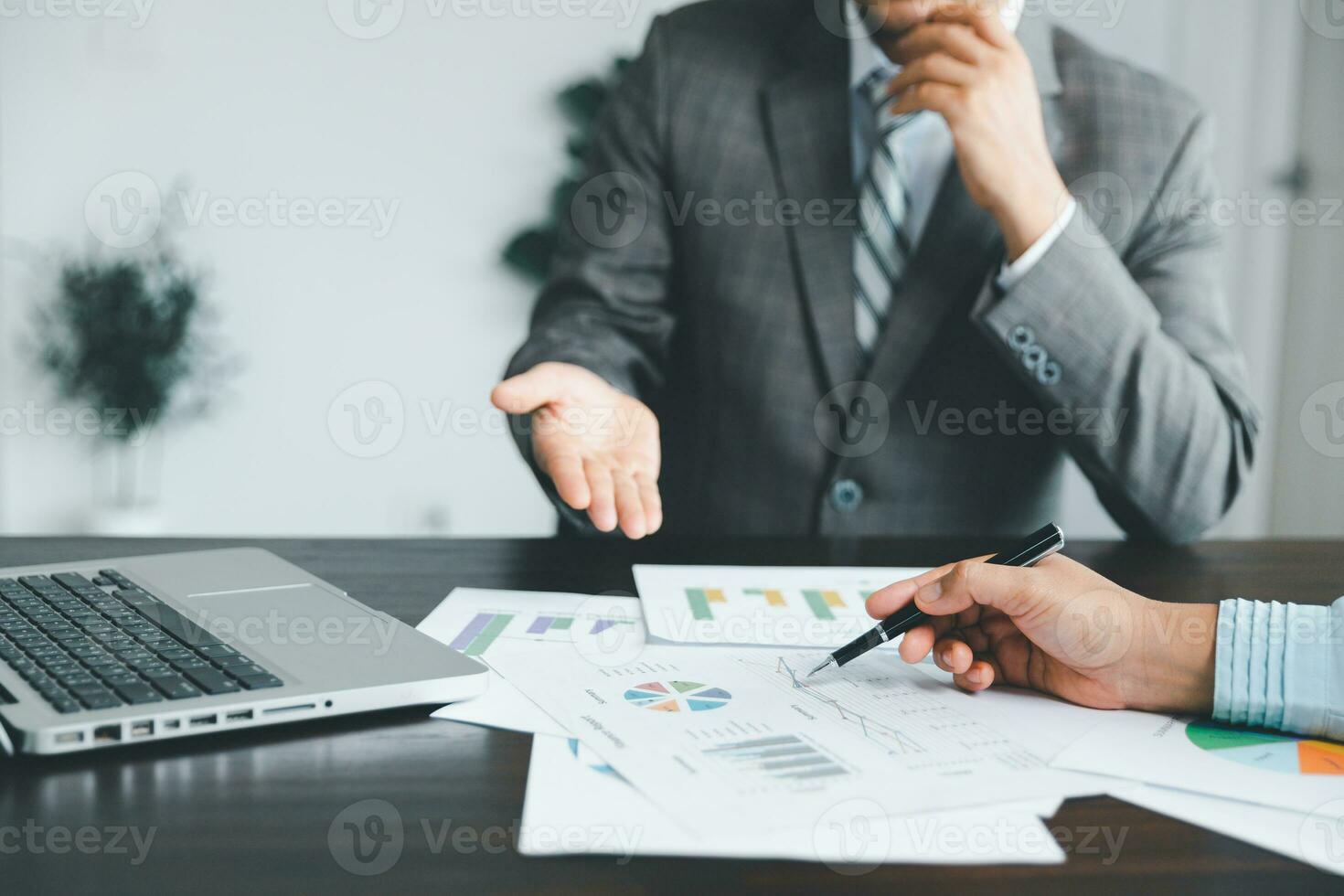 Business team collaboration discussing working analyzing with financial data and marketing growth report graph in team, presentation and brainstorming to strategy planning making profit of company. photo