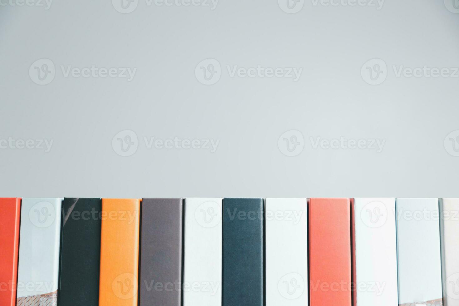 Book stack in the library room and blurred stack book for business and education background, back to school concept. Copy space for text. Distance education, e-learning concept. photo