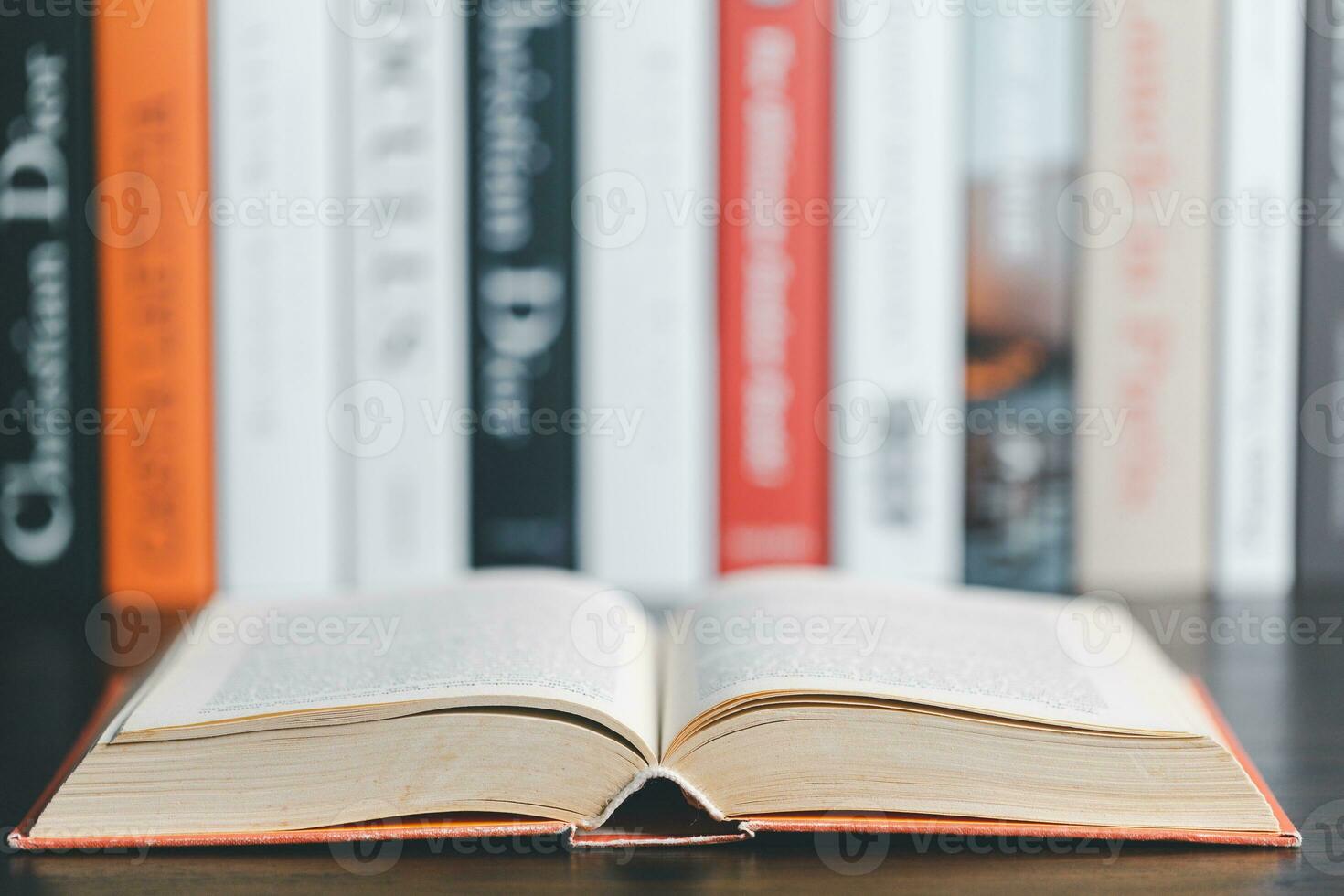 Book stack in the library room and blurred stack book for business and education background, back to school concept. Copy space for text. Distance education, e-learning concept. photo