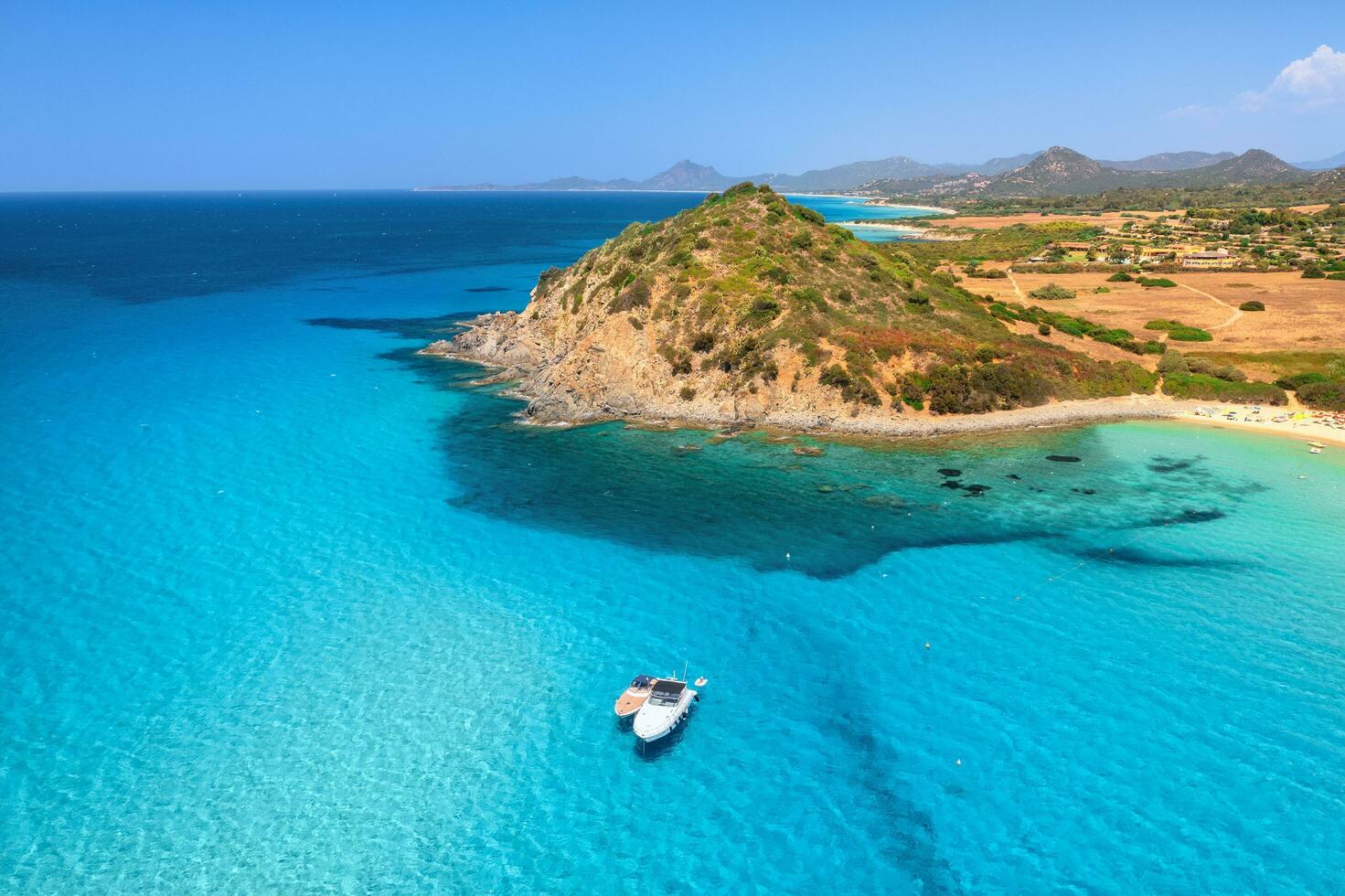 Aerial view of luxury yachts on blue sea at sunset in summer photo